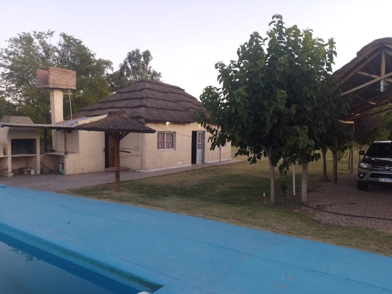 SE VENDE TERRENO DE 2000 M2 CON QUINCHO Y PISCINA
