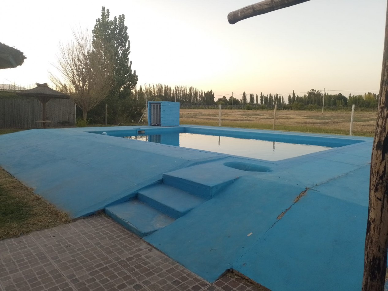SE VENDE TERRENO DE 2000 M2 CON QUINCHO Y PISCINA