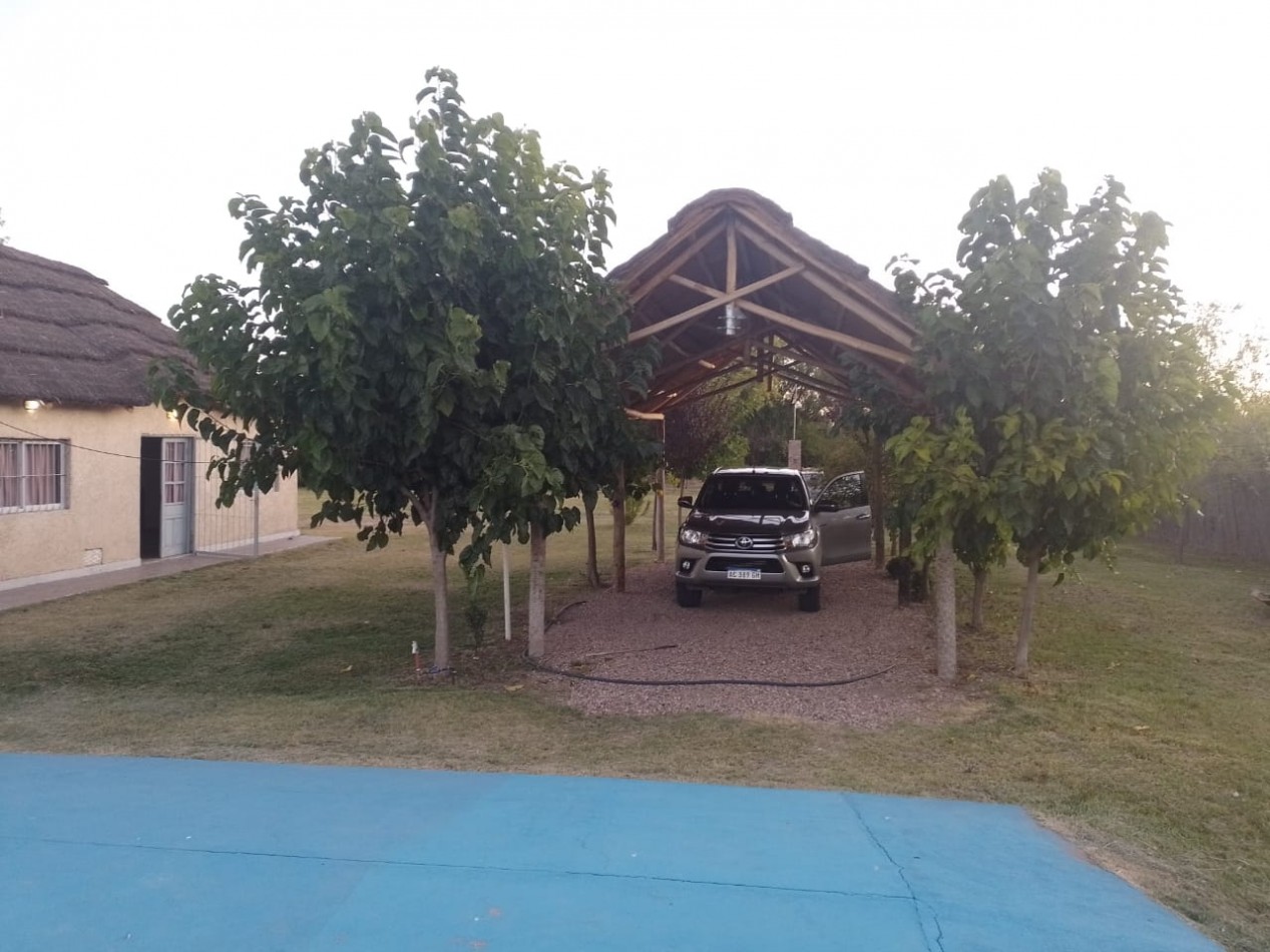 SE VENDE TERRENO DE 2000 M2 CON QUINCHO Y PISCINA