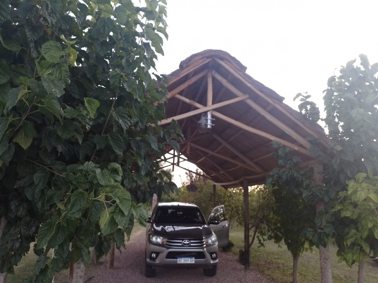 SE VENDE TERRENO DE 2000 M2 CON QUINCHO Y PISCINA