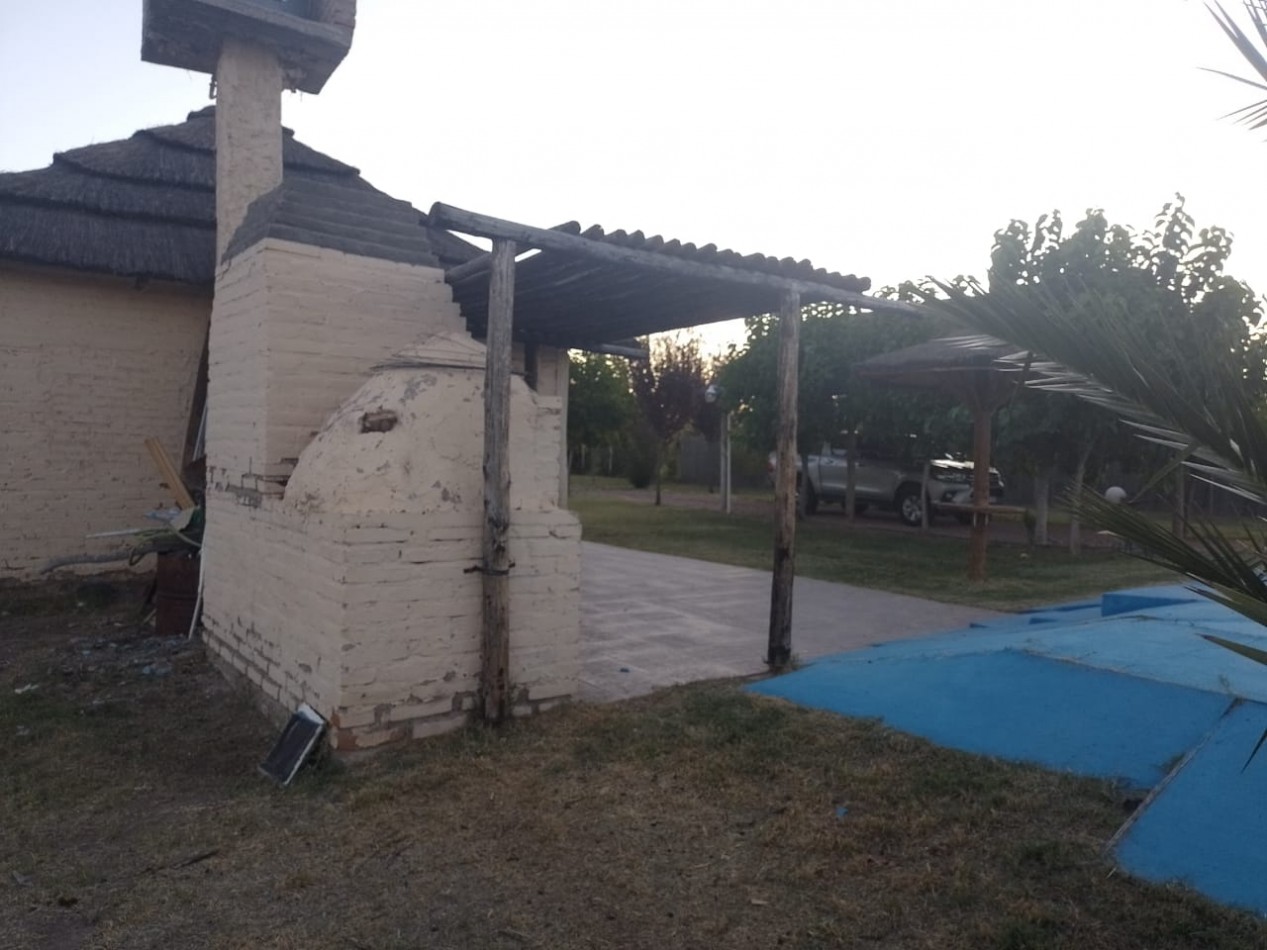 SE VENDE TERRENO DE 2000 M2 CON QUINCHO Y PISCINA