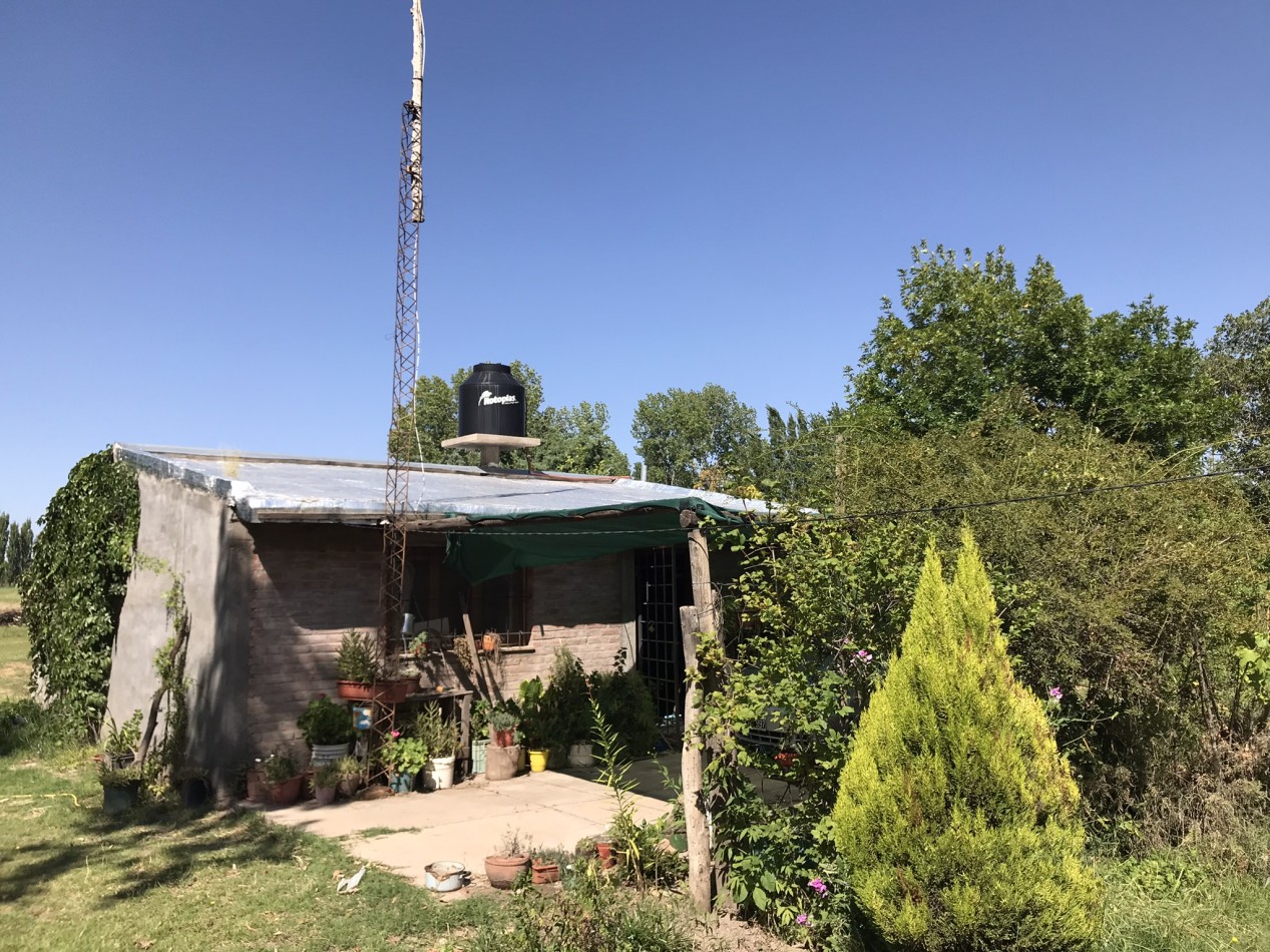 FINCA DE 2 HECTAREAS CON CASAS CERCA AEROPUERTO